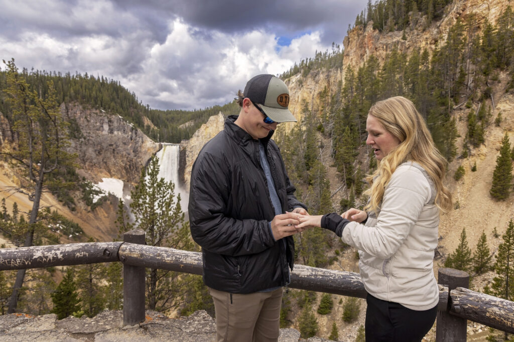 JaLayne reacts with shock and emotion to Andrew’s surprise proposal, surrounded by nature’s grandeur.