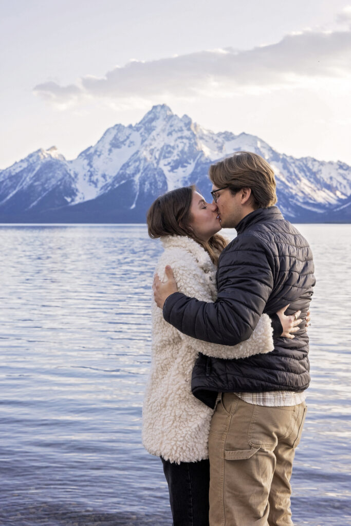 The couple embracing after the proposal