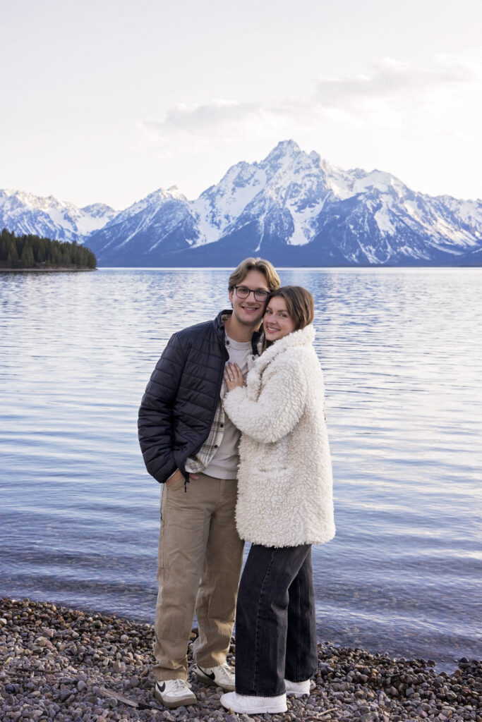 Avery and Riley share a sweet hug immediately after the surprise proposal at Jackson Lake.