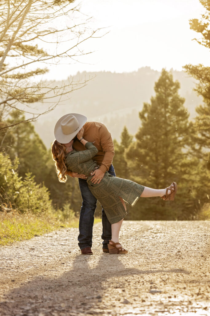 Bride and groom kissing in Madison Valley at golden hour