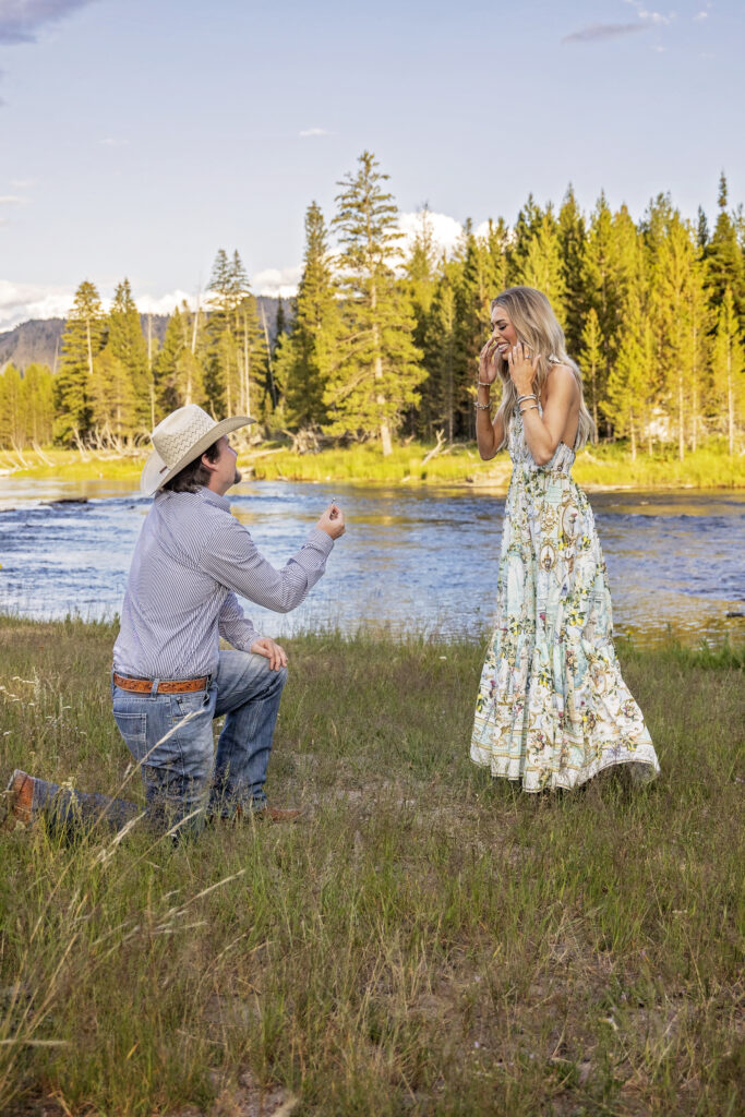 Man proposing along the Madison River in Yellowstone